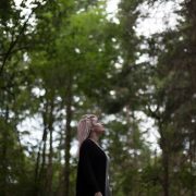 girl in forest at sunset