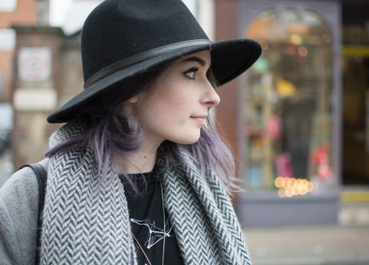 girl wearing fedora hat