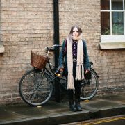 girl stood by bicycle - a few hours in Cambridge