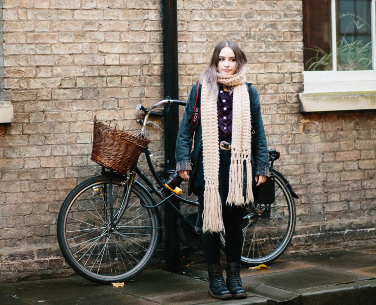 girl stood by bicycle - a few hours in Cambridge