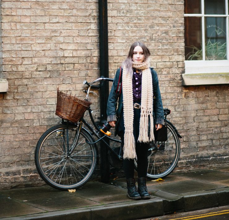 girl stood by bicycle - a few hours in Cambridge