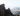 man standing on point at quiraing isle of skye | top 5 rural uk breaks