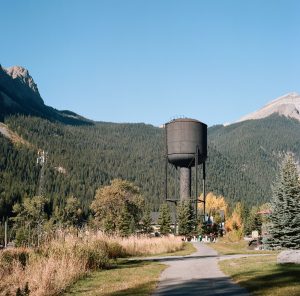 water tower in field british columbia
